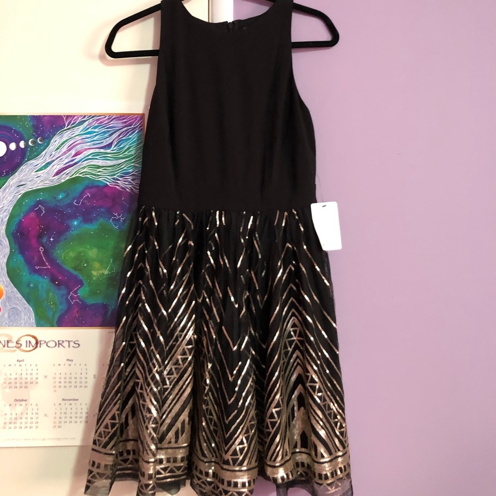 Black dress with gold! Tags still on!🤍